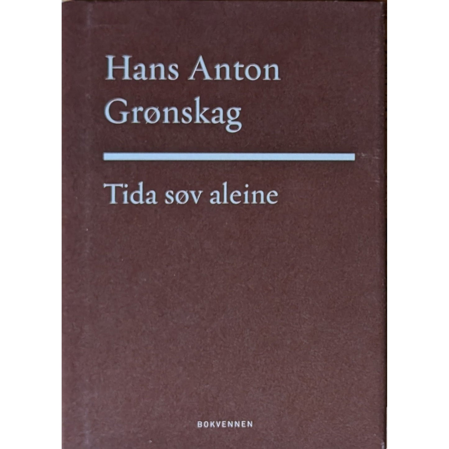 Tida søv aleine. Brukt poesibok av Hans Antoen Grønskag. Inventaret bokhandel