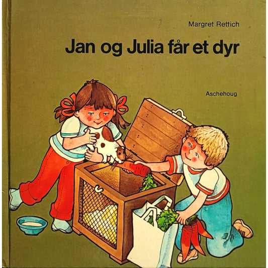 Jan og Julia får et dyr, brukte bøker av Margret Rettich